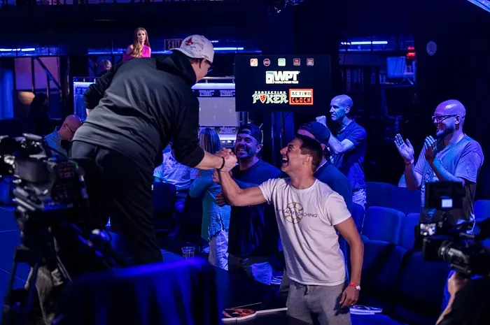 Chance Kornuth congratulates Mark Davis after winning a WPT title